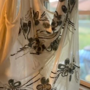 Beaded loose shirt w/ open back
